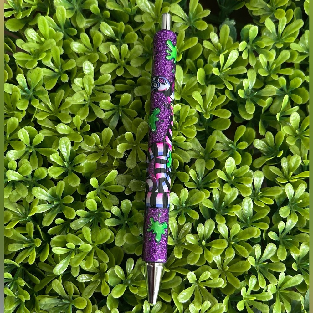 Beetlejuice glitter pen .